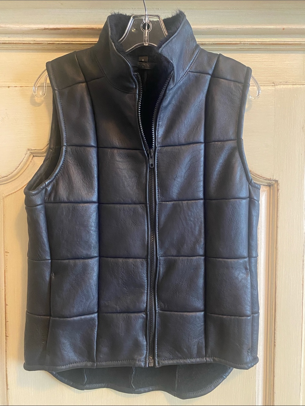 Vintage Bonz New England Women’s lamb skin leather vest.